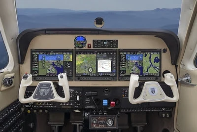 Garmin AXIS Flight Display System Integrates PFD, IFR GPS, NAVCOMM, and Audio Panel