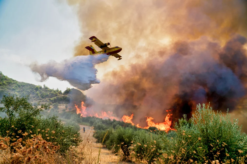 Greek wildfires deepen Europe's summer tourism climate crisis