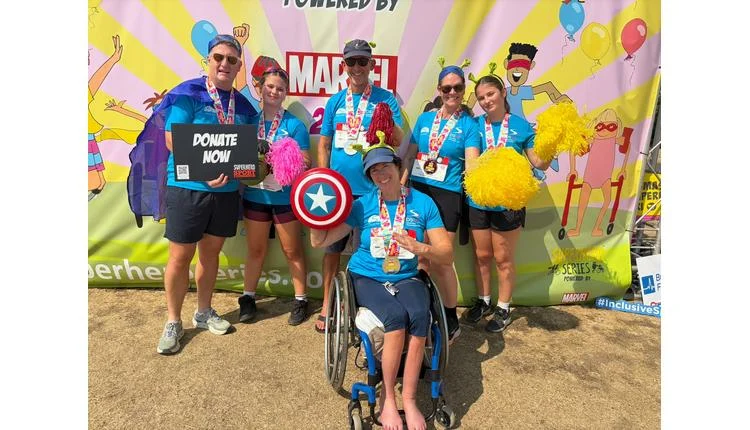 Iglu Ski team raises £700 for Disability Snowsport UK at Superheroes Triathlon